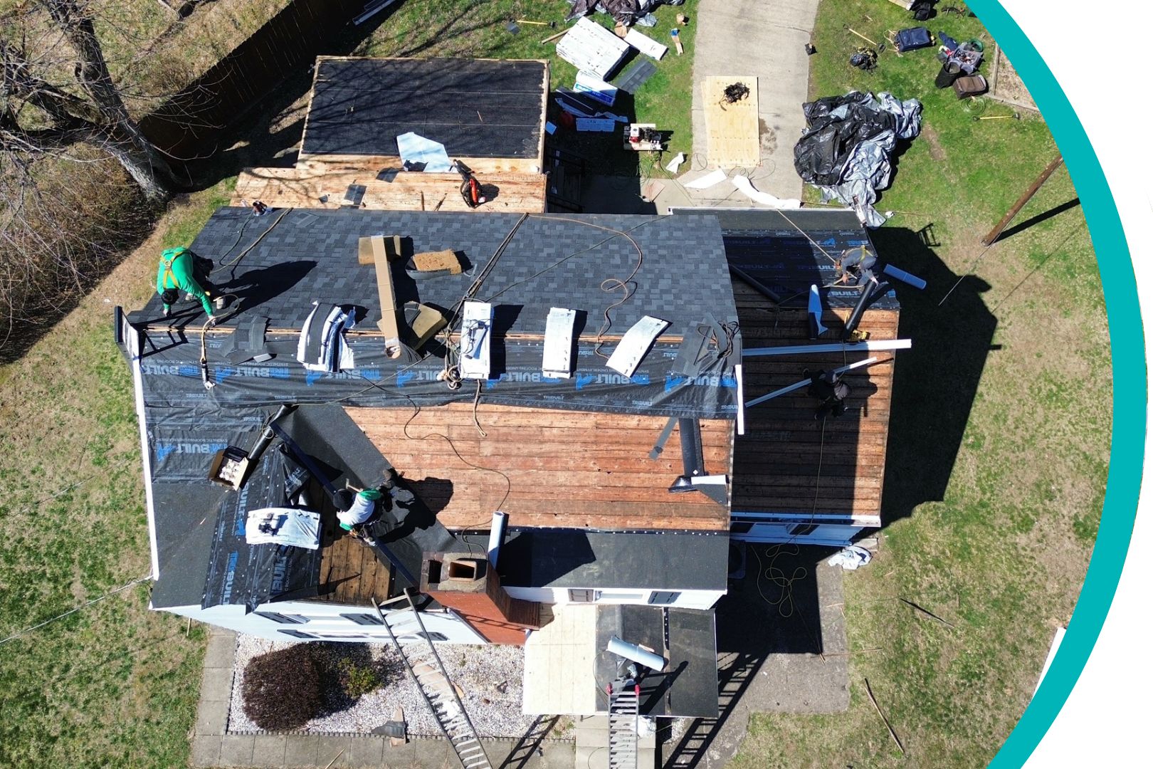 roof repair experts from D1 Roofing repairing the roof of a home in Pittsburgh, PA