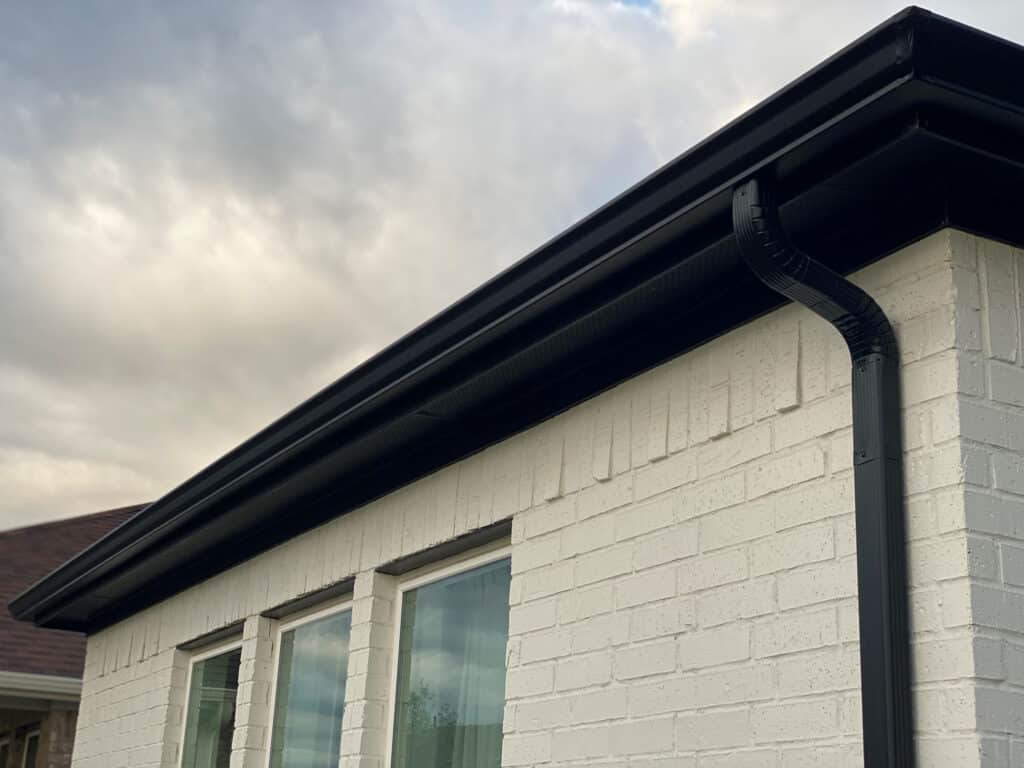 newly installed seamless gutters seen on the roofline of a home in Youngstown, OH