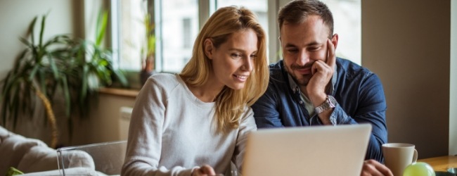 couple looking at laptop